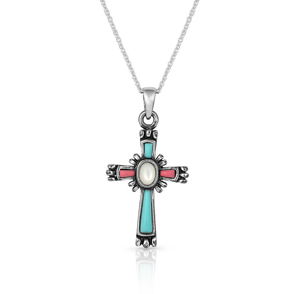 Montana Silversmiths Faith Beaming Cross Necklace. A silver-toned cross necklace with turquoise and coral-pink gems, hanging from a silver-toned chain.