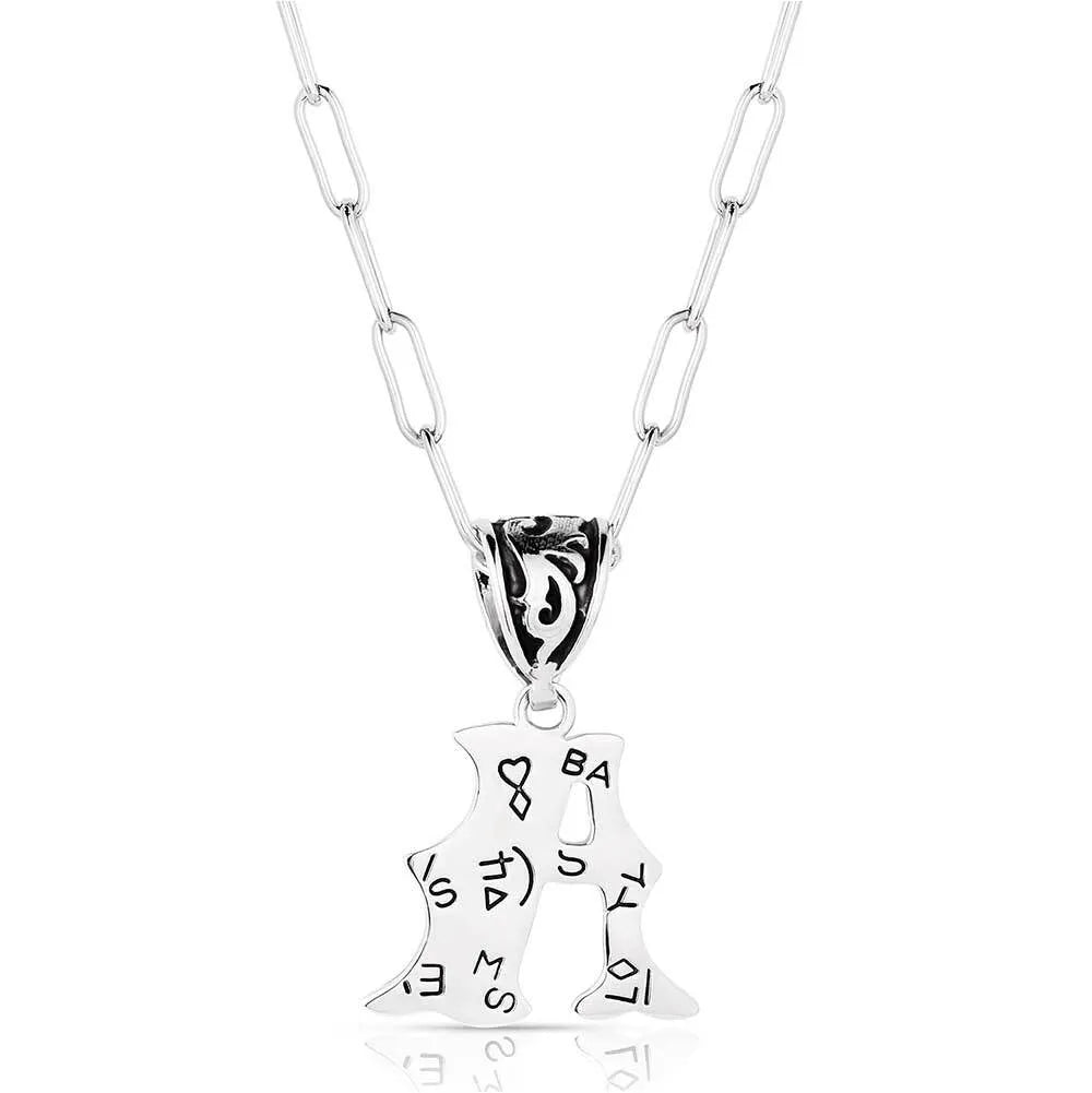 Montana Silversmiths Western Initials Necklace. Silver necklace with a letter 'R' pendant on a white background