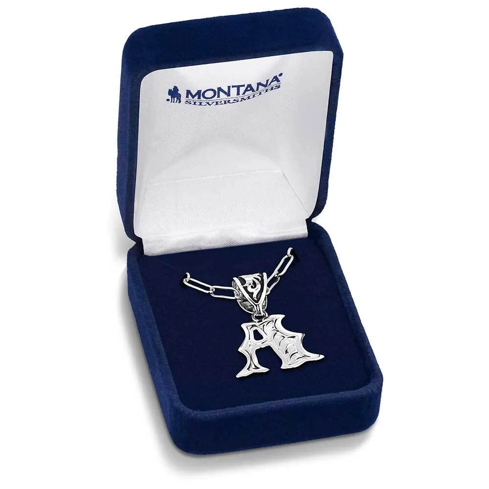 Montana Silversmiths Western Initials Necklace. Silver necklace with pendant in a Montana Silversmiths box on a white background