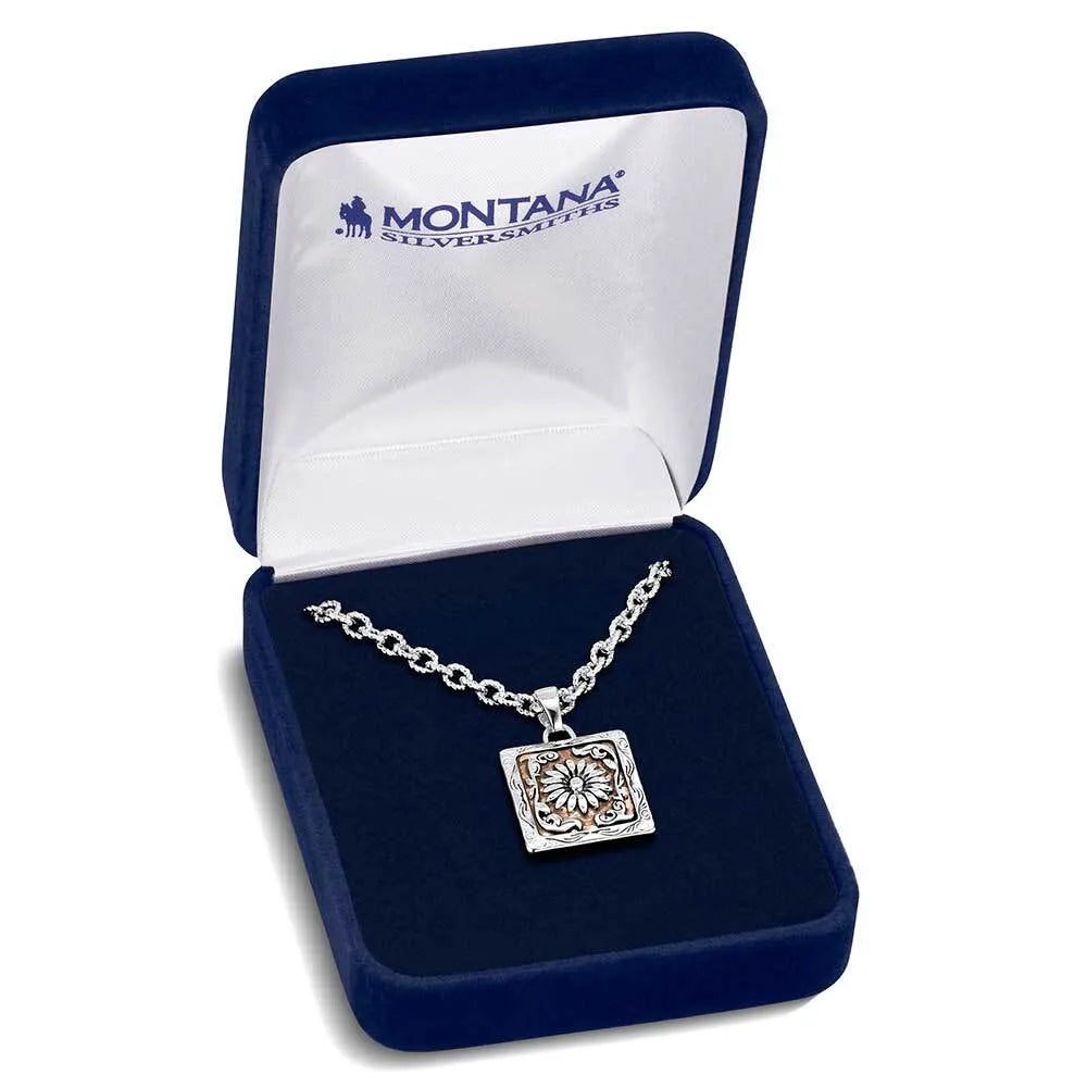 Silver necklace with a square pendant in a Montana Silversmiths box