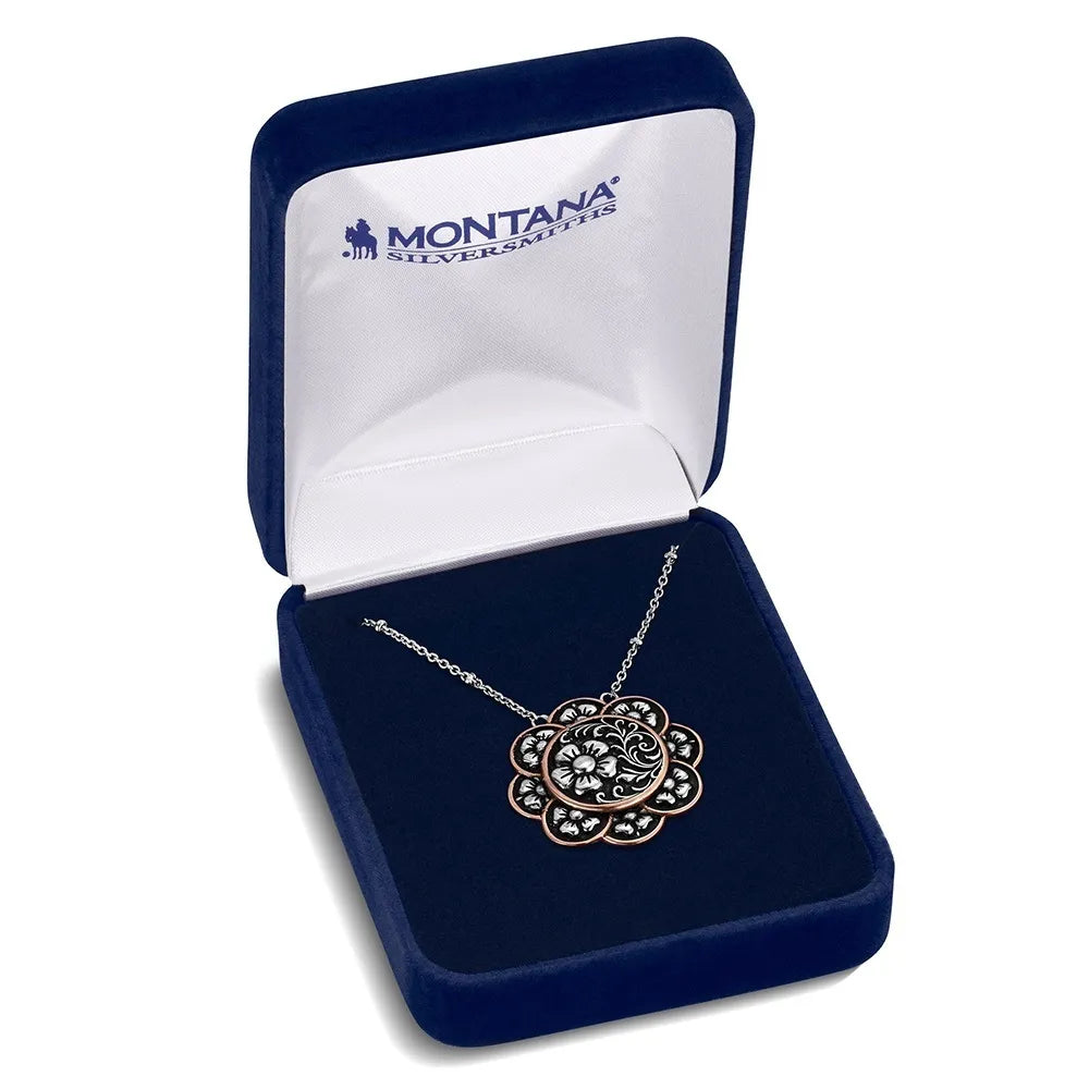Silver necklace in a Montana Silversmiths box on a white background
