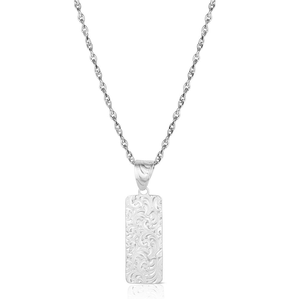 A silver rectangular pendant necklace with an engraved floral scroll pattern, suspended from a matching silver chain against a plain white background.
