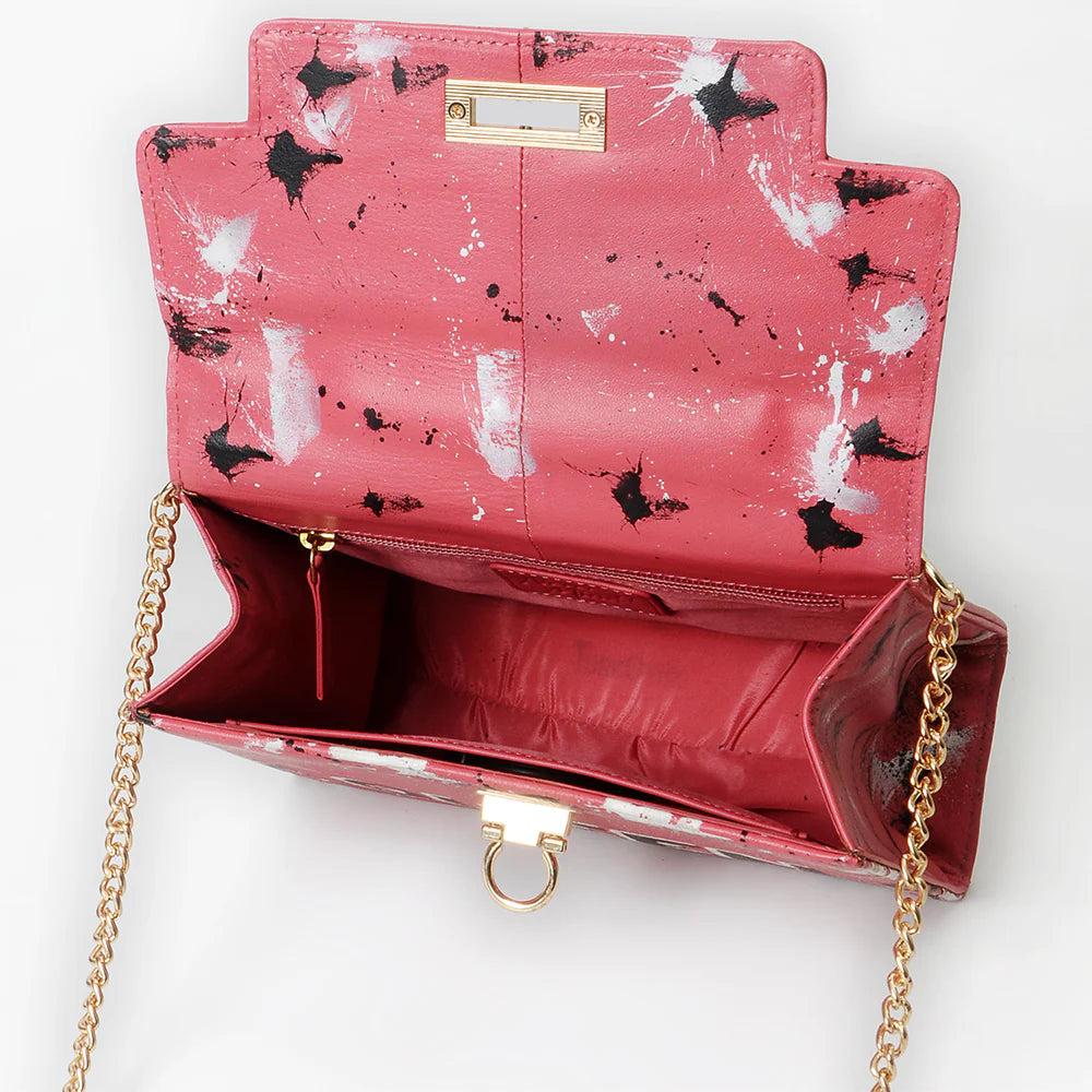 American Darling Rodeo Queen Statement Western Bag. Pink handbag with black and white abstract pattern on a white background