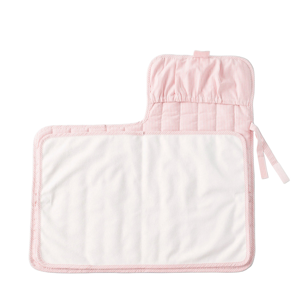 Pink and white baby changing pad with a strap on a gray background