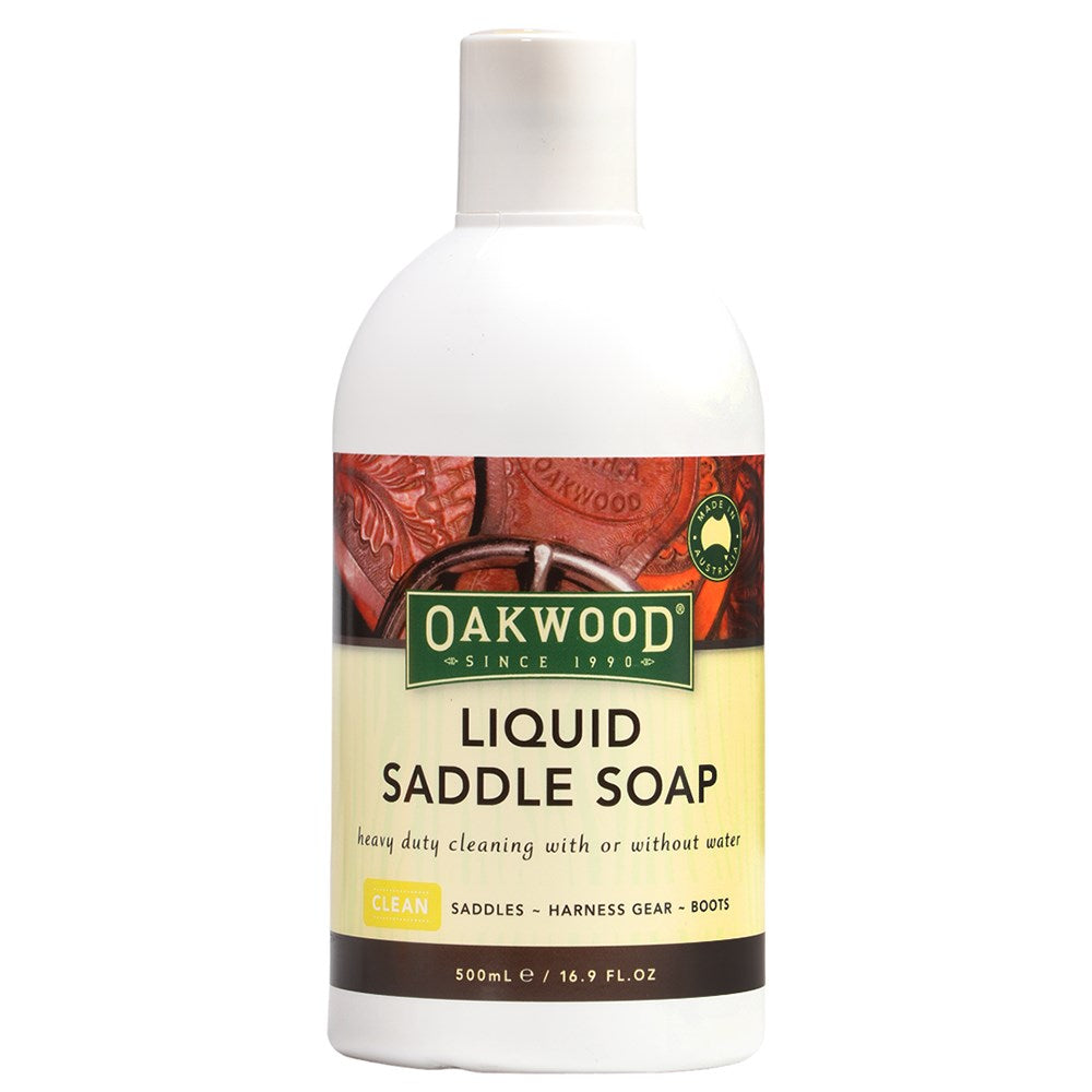 A 500 mL white plastic bottle of Oakwood Liquid Saddle Soap with a white cap, featuring a label with brown leather imagery and a cream background.