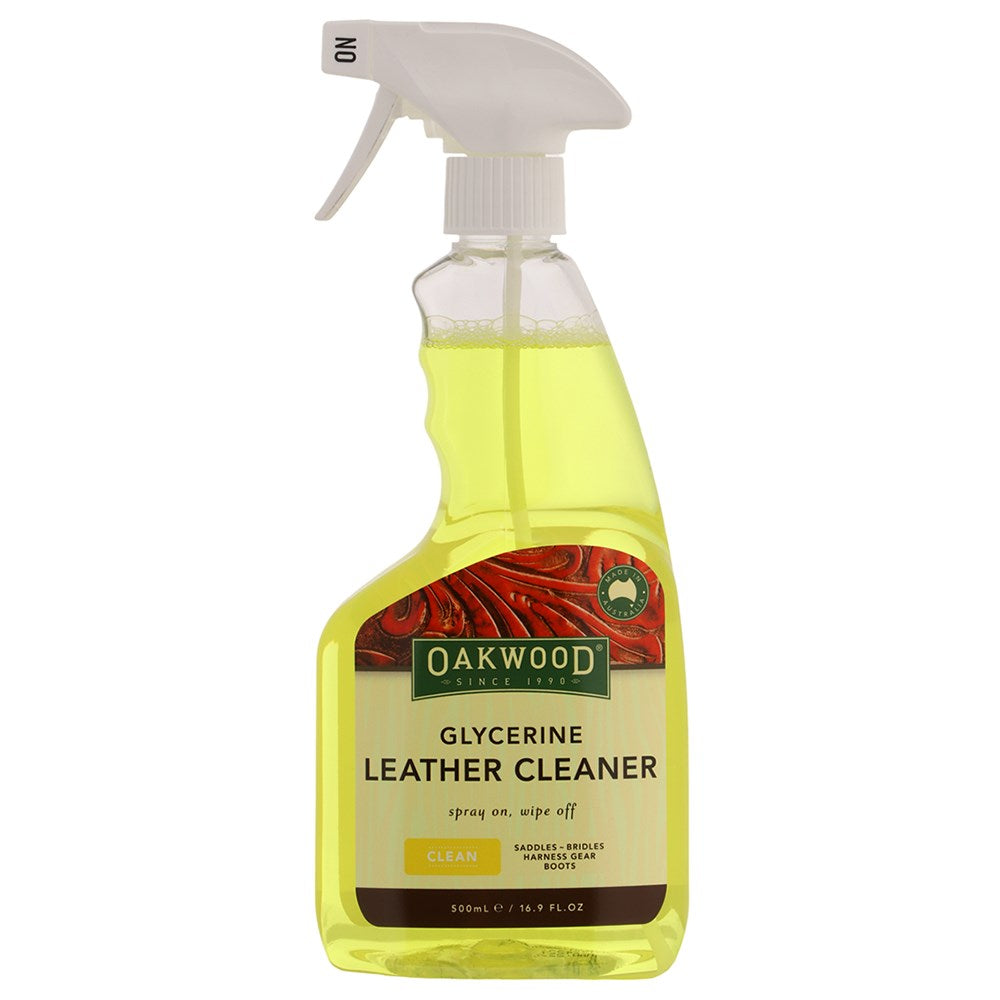 Oakwood Leather Cleaner spray bottle with a white trigger sprayer and clear plastic bottle showing yellow liquid inside, on a white background.