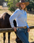 Pure Western Women's Polly Western Belt. Woman in cowboy hat and Western attire standing next to a horse in a field, with 'PURE Western' branding.