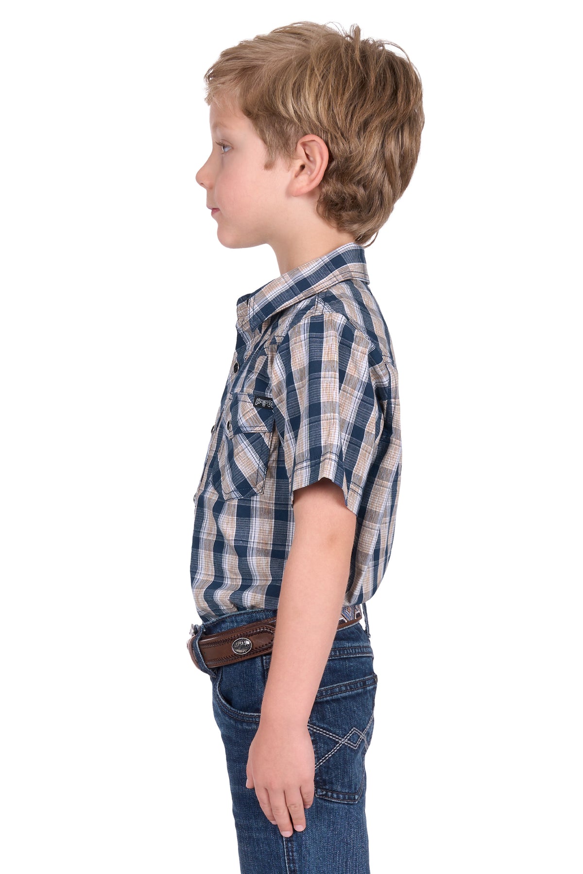 Pure Western Boy's Peter S/S Western Shirt. Young boy wearing a plaid shirt and jeans on a white background