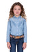 Pure Western Girl's Pheobe L/S Western Shirt. Young girl wearing a light blue denim shirt with ruffles and dark blue jeans on a white background