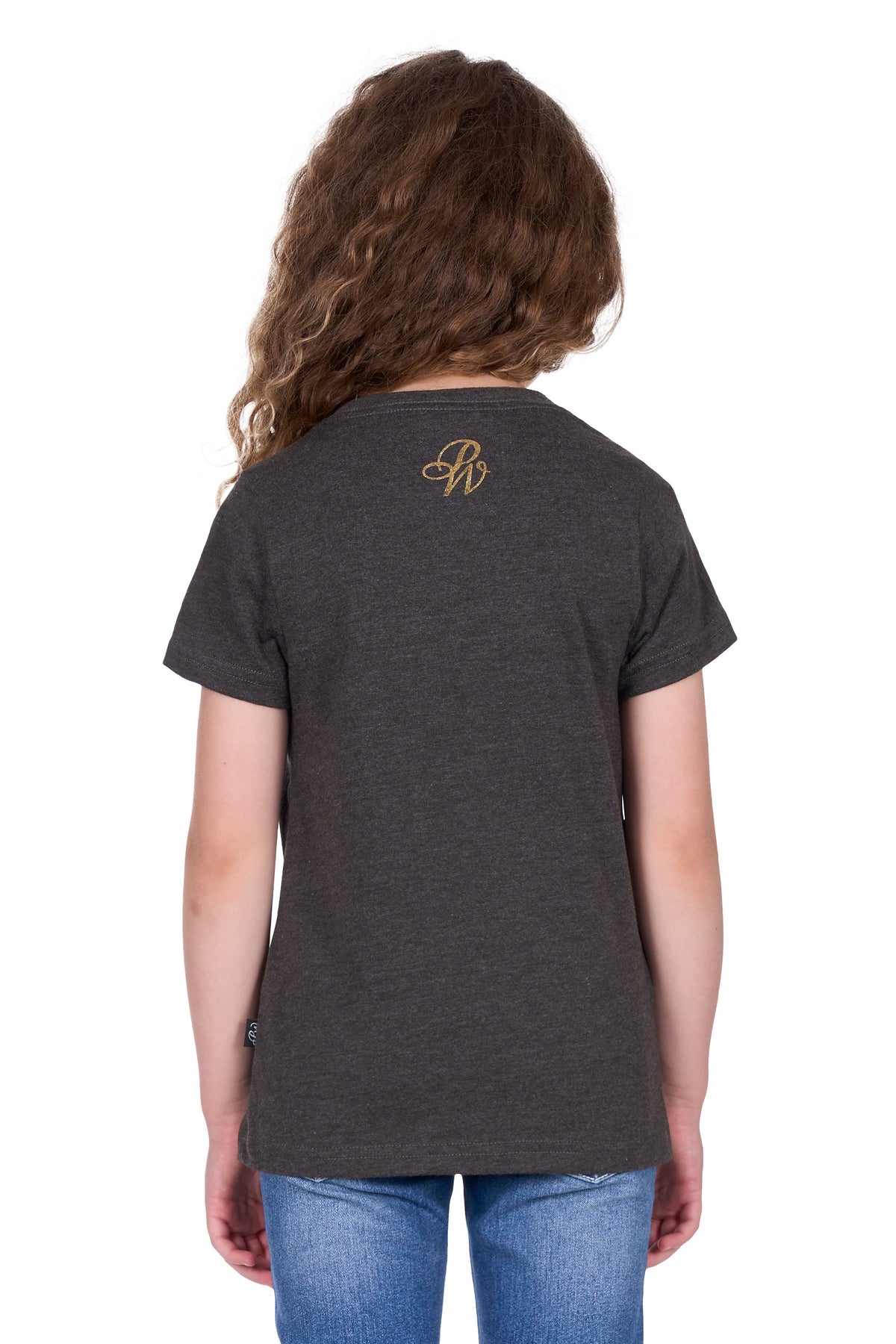Pure Western Girl's Bonita Western T-Shirt. Person wearing a dark gray t-shirt with a logo on the back, standing against a white background
