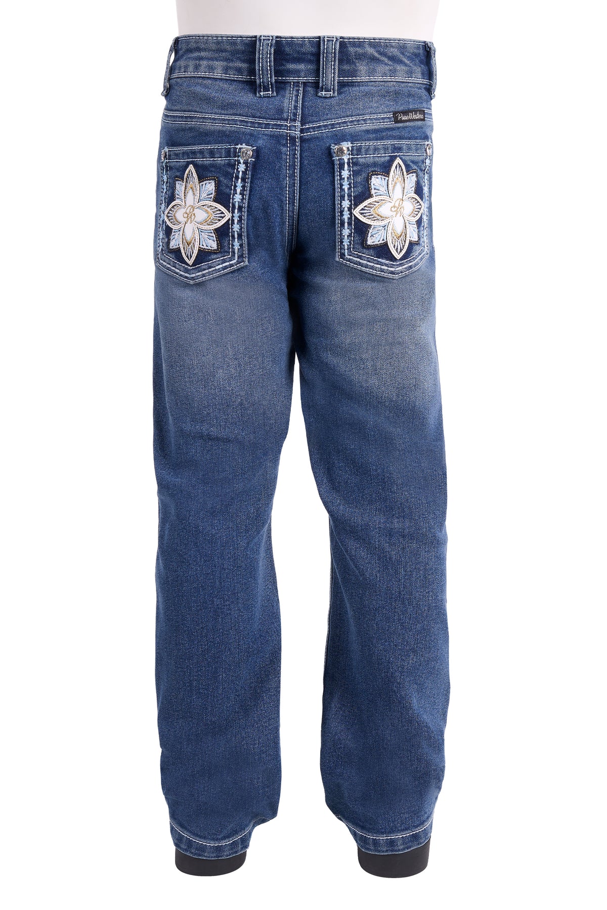 Rustic blue denim jeans shown from the back, featuring large white embroidered flower patches on the back pockets.
