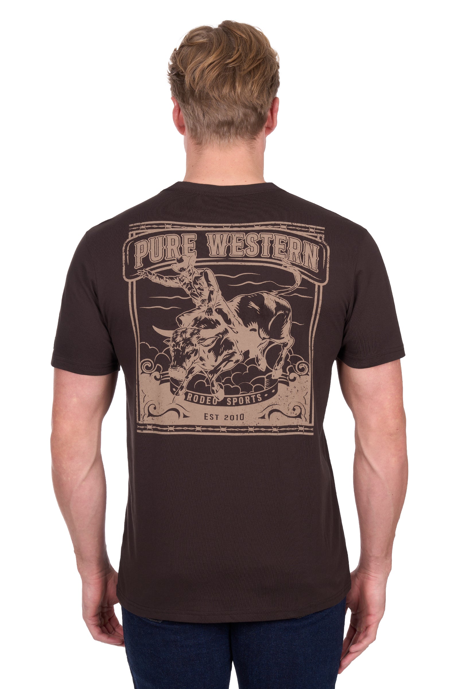 Man wearing a brown t-shirt with 'Pure Western' logo on the back, standing against a white background