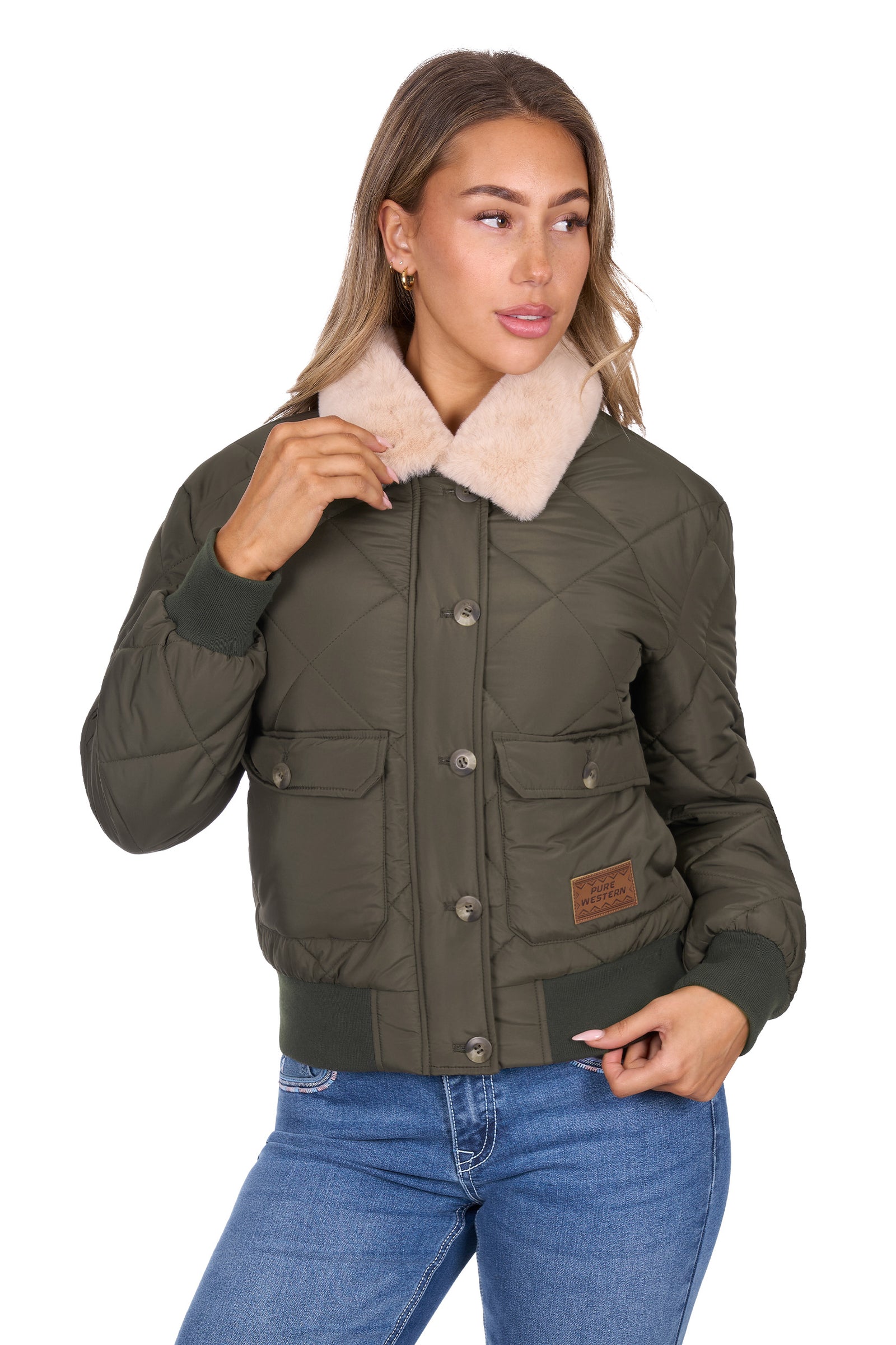 Woman wearing a green jacket with a fur-lined hood on a white background