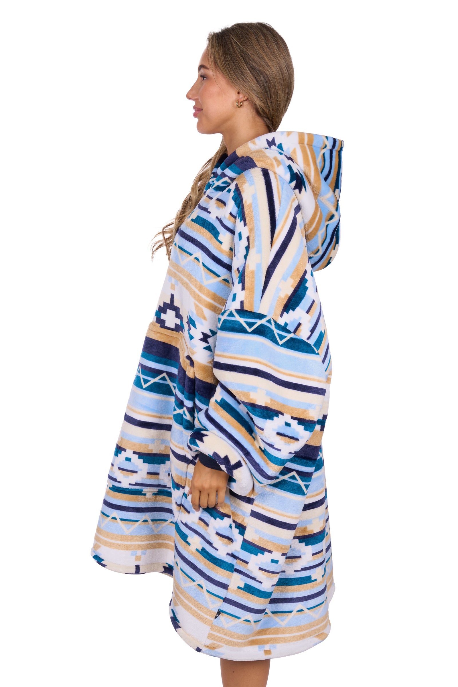 Woman wearing a colorful patterned robe on a white background