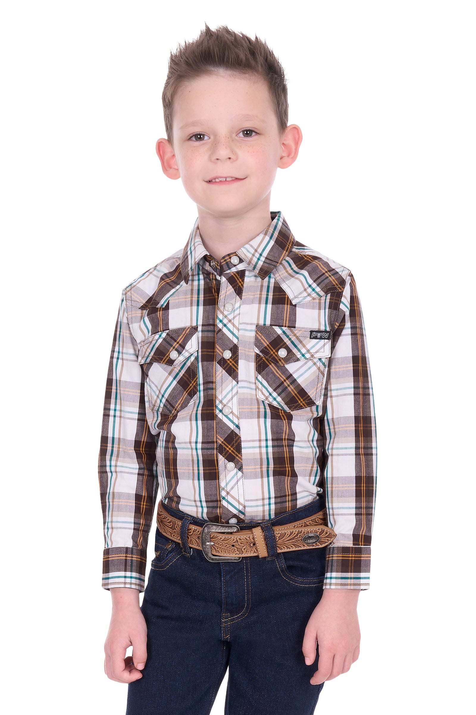 Young boy wearing a plaid shirt and jeans on a white background