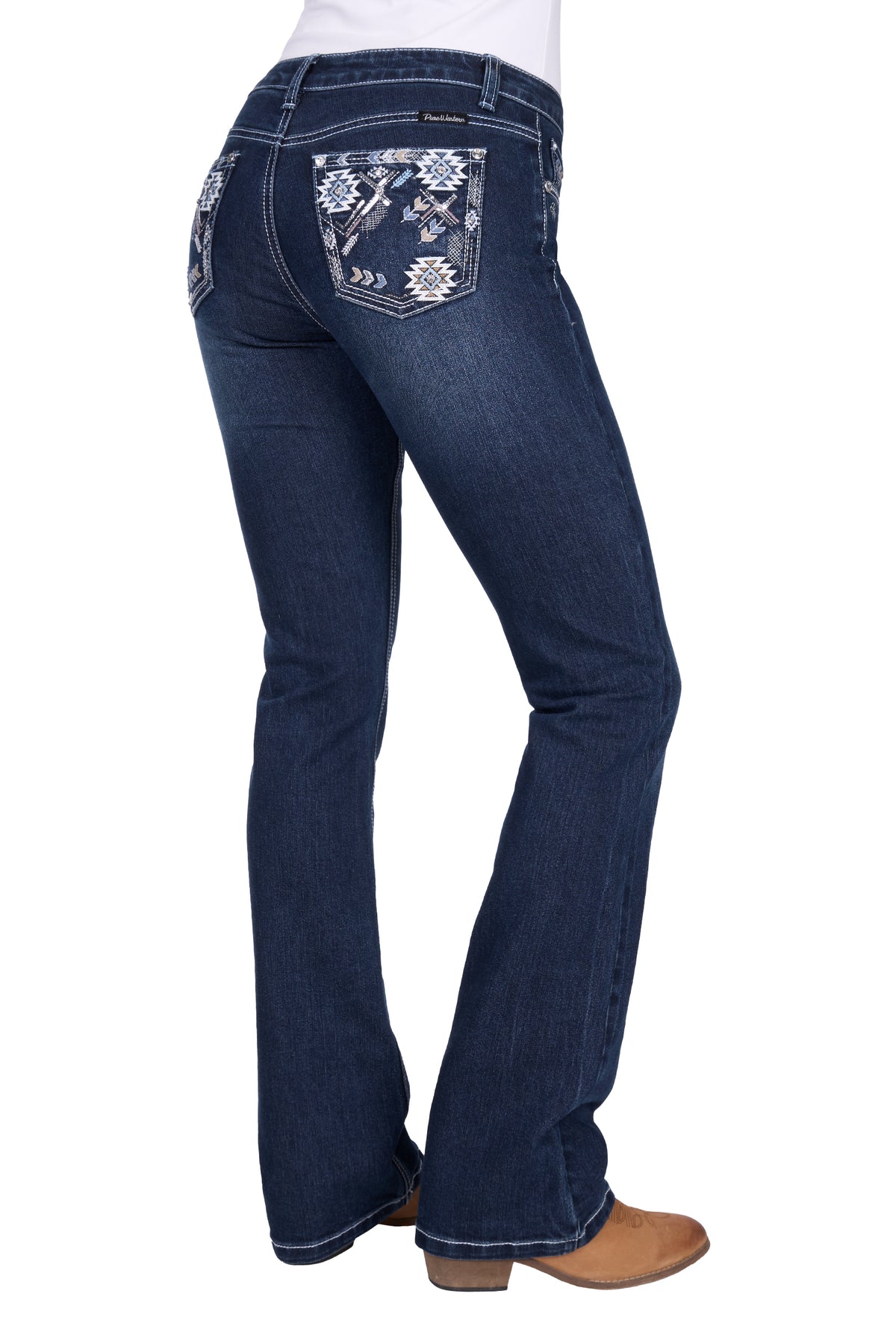 Blue jeans with floral embroidery on the back pocket against a white background