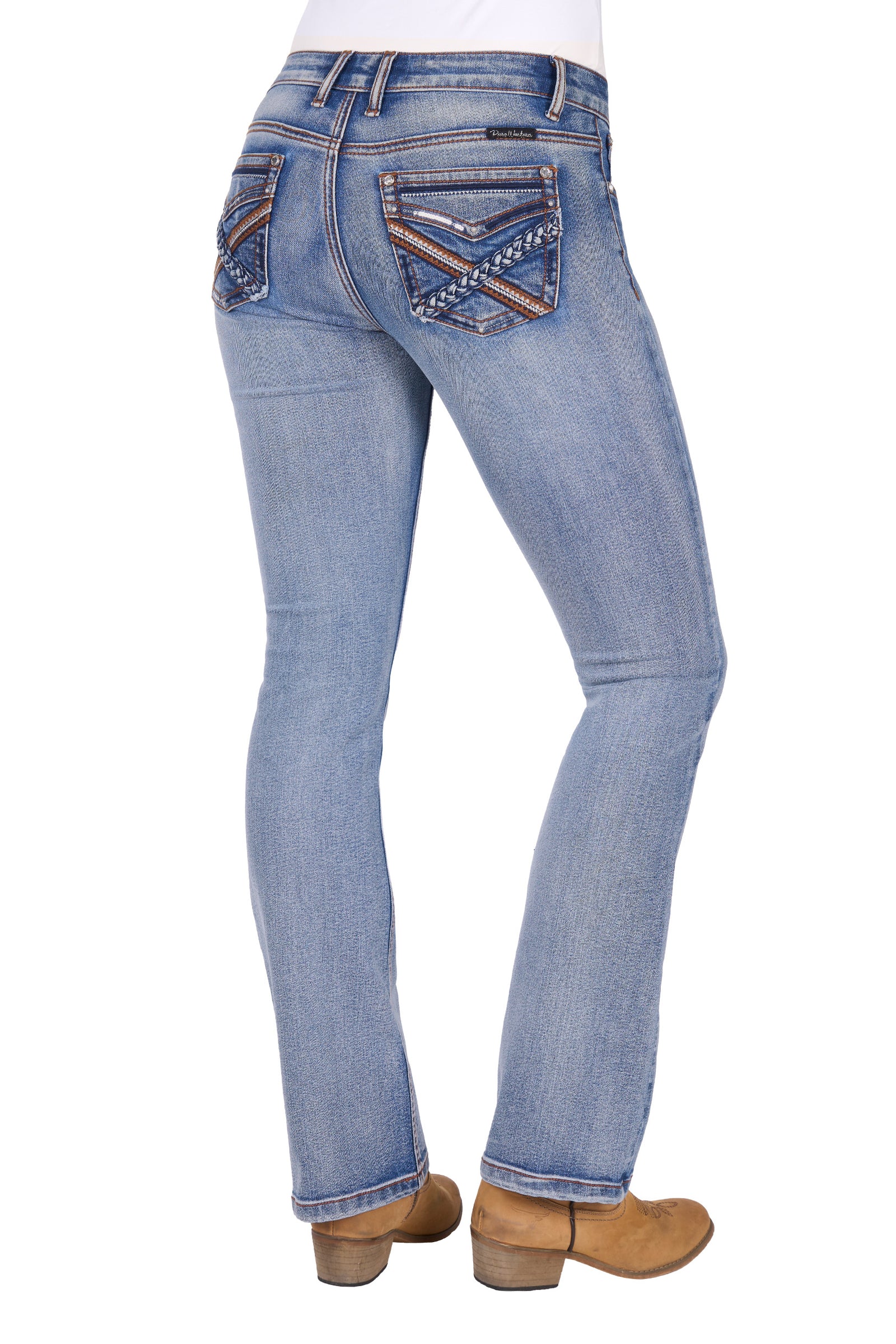 Blue jeans with decorative stitching on a white background