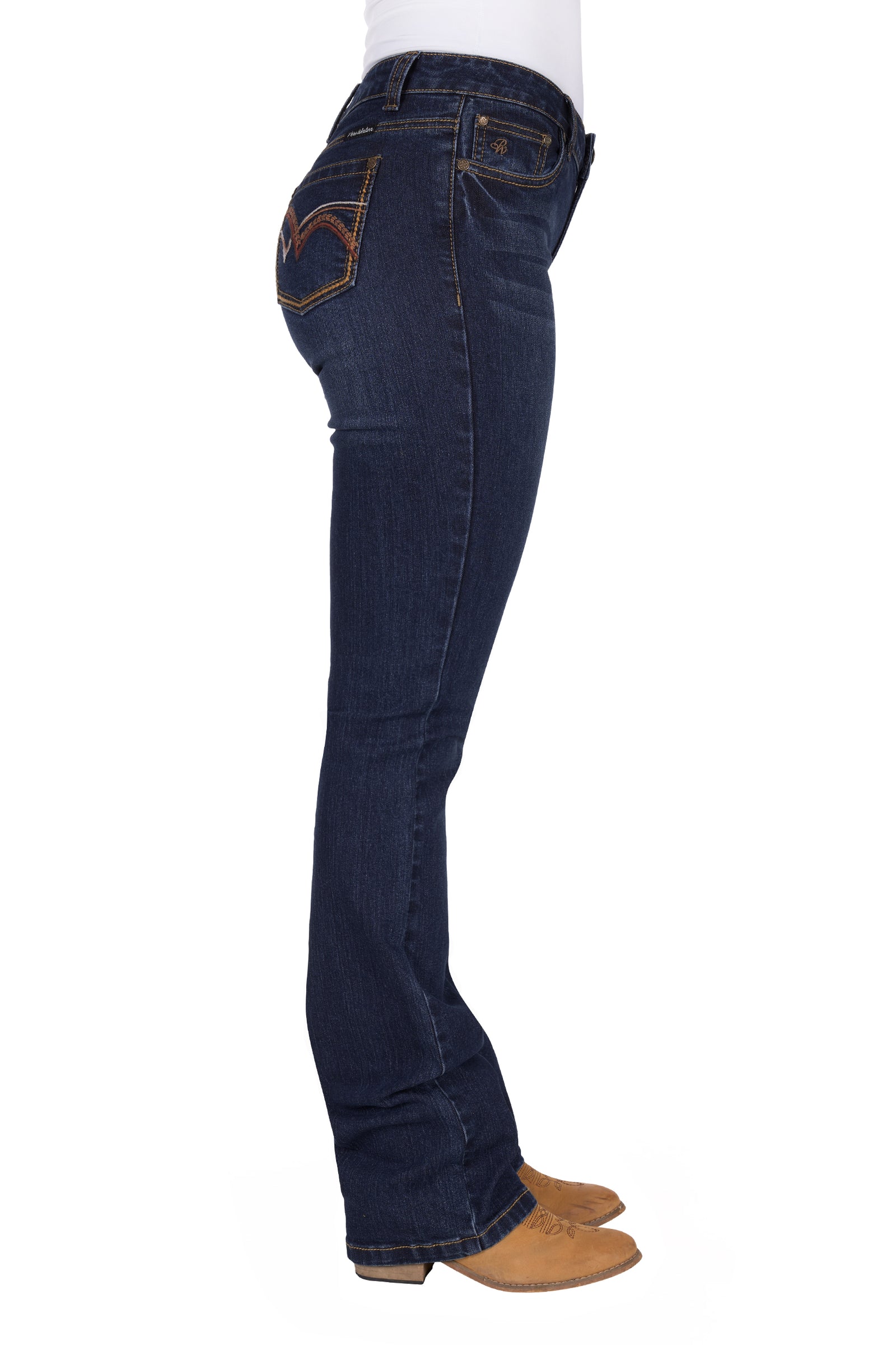 Pure Western Women's Sam Relaxed Rider Jean. Dark blue jeans worn by a person on a white background