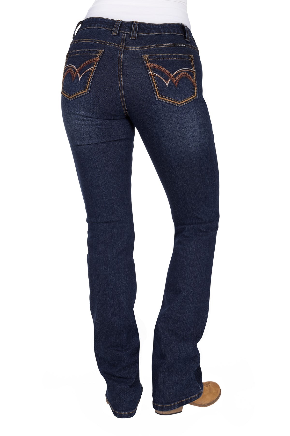 Pure Western Women's Sam Relaxed Rider Jean. Dark blue jeans with decorative stitching on a white background