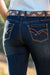 Pure Western Women's Sam Relaxed Rider Jean. Close-up of blue jeans with decorative belt and stitching details.