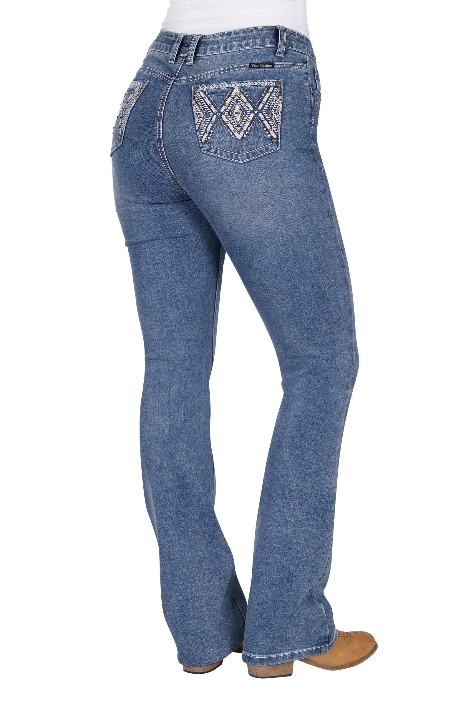 Pure Western Women's Pam High Rise Boot Cut Jean. Blue jeans with decorative stitching on a white background
