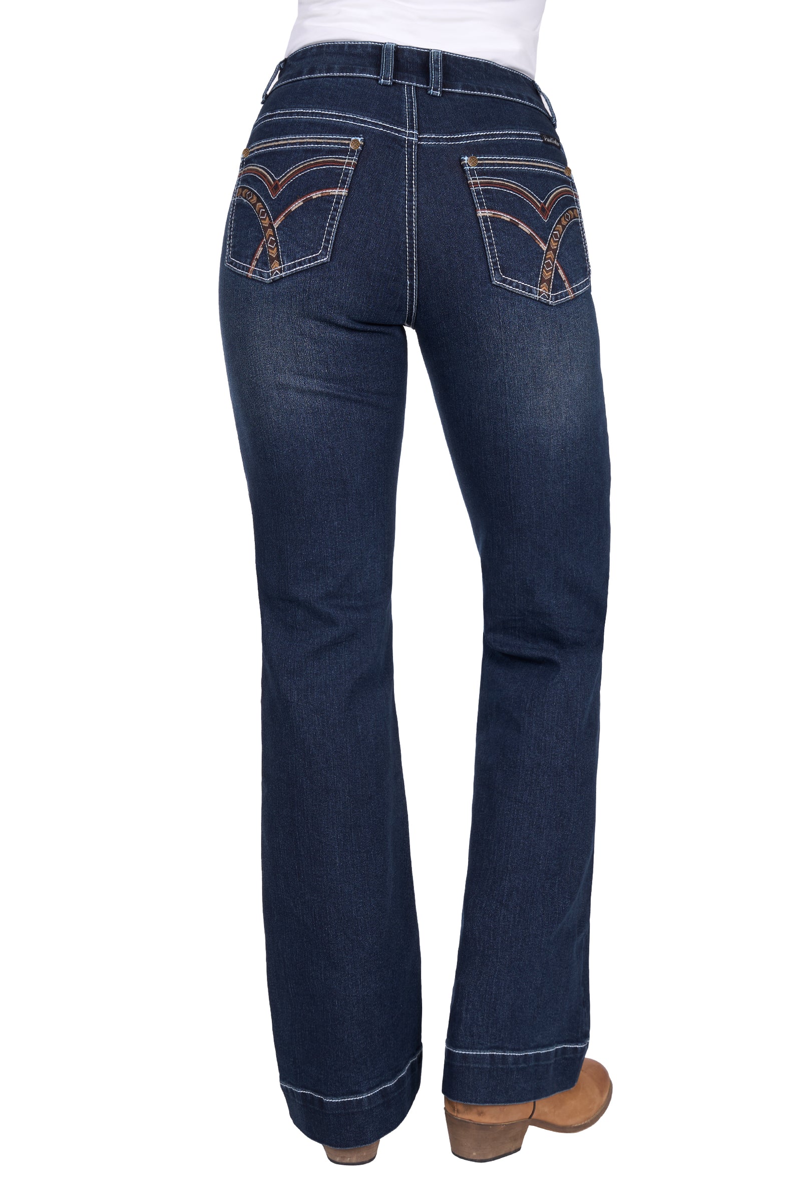 Dark blue jeans with decorative stitching on a white background