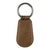 Pure Western Mia Hat Clip. Brown leather key fob with floral patterns on a white background