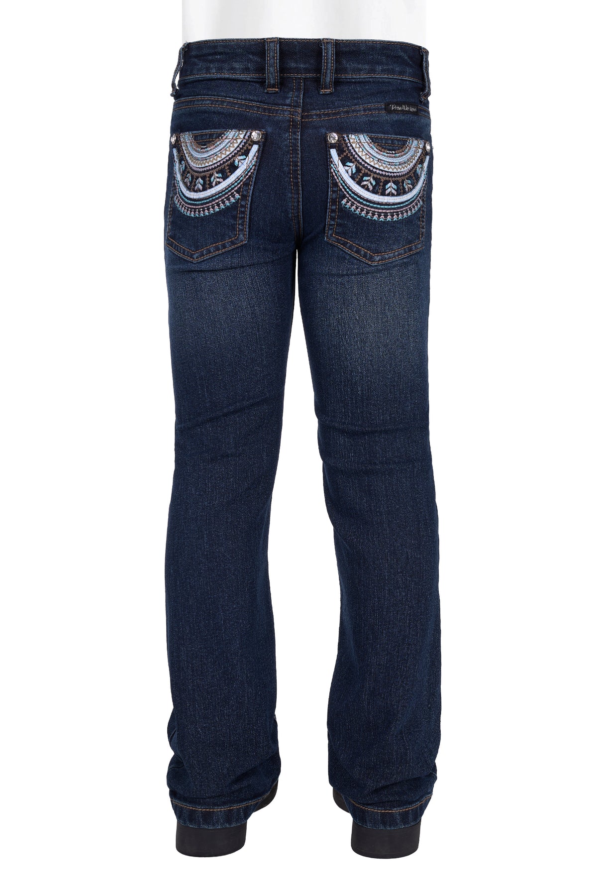 Blue jeans with decorative stitching on a white background