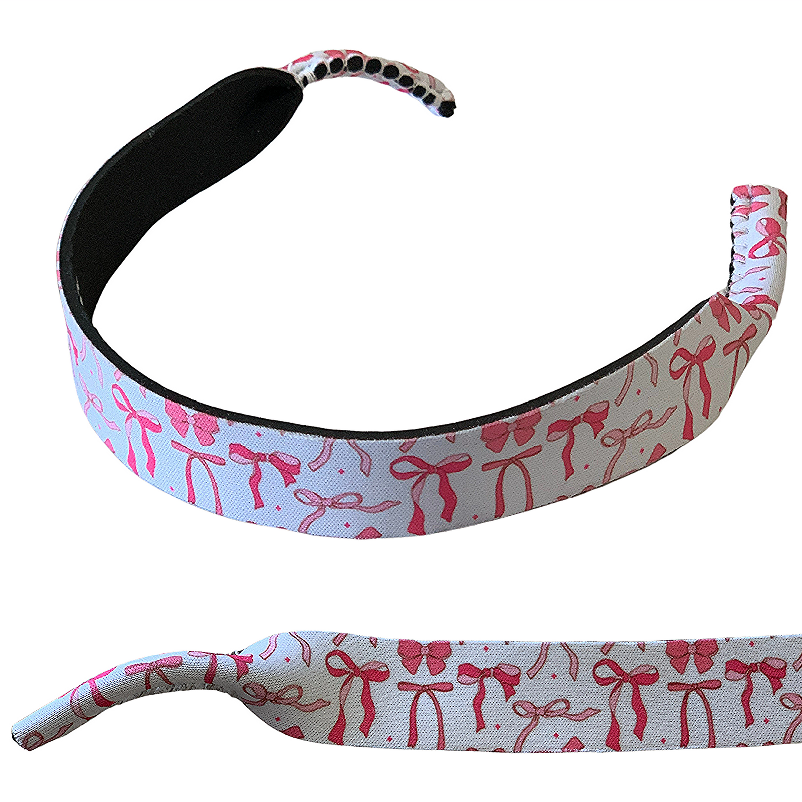 Rocky Mavericks Pink Ribbon Sunglasses Strap. A pink ribbon-themed sunglasses strap with a pattern of ribbons.