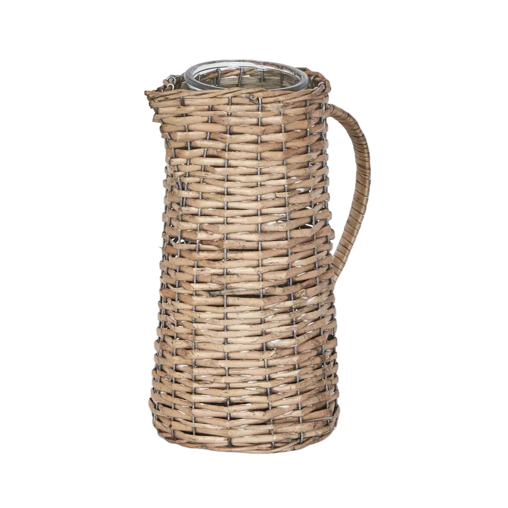 Large Jug with Glass Insert. Wicker pitcher on a white background