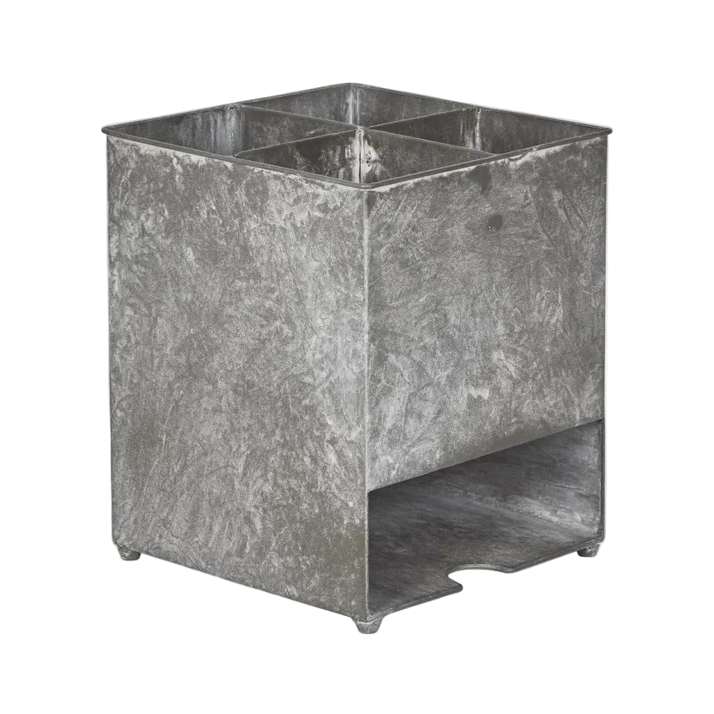 Burgundy Caddy. Metal caddy with a textured surface on a white background