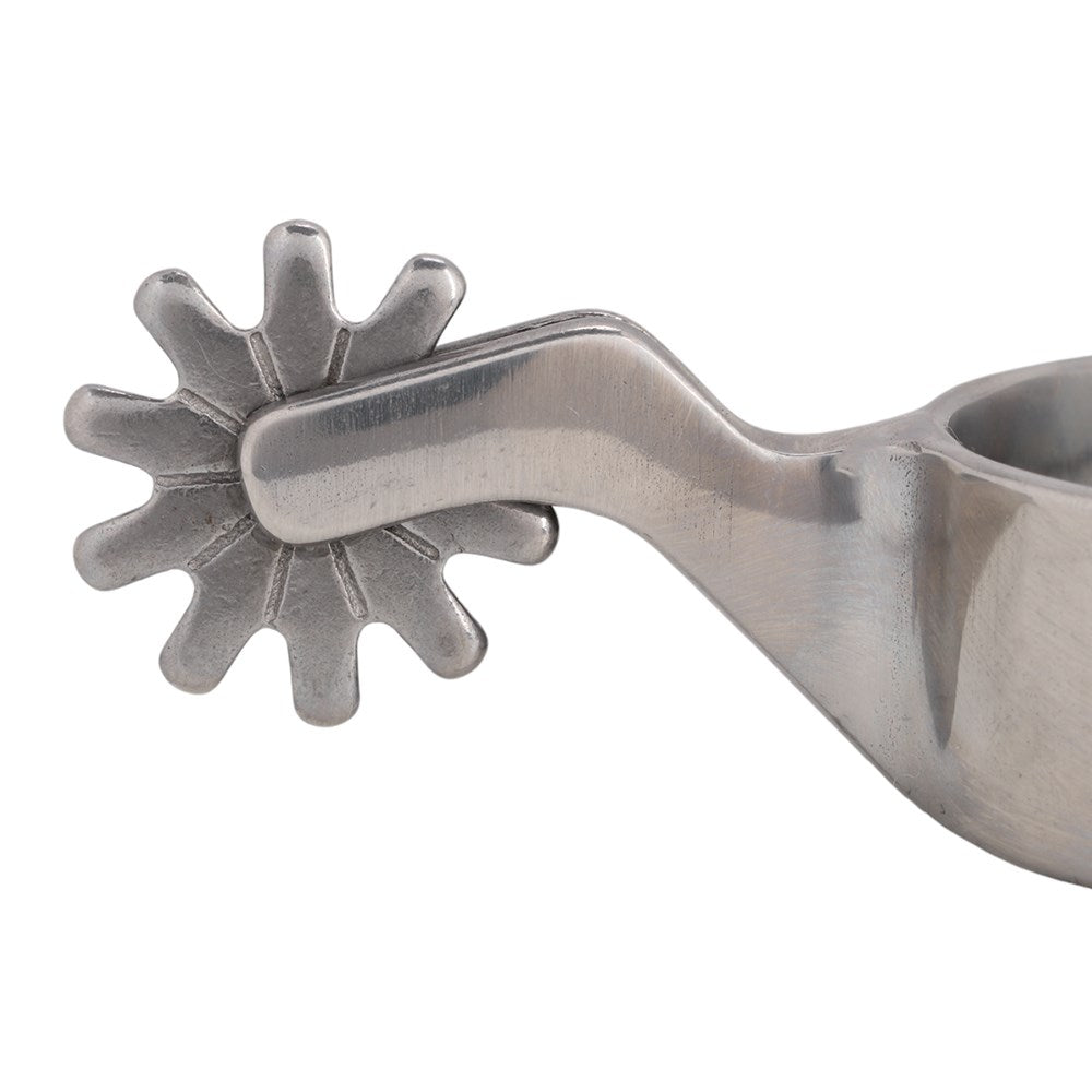 A close-up of a metallic silver cowboy spur with a multi-pointed star-shaped blade and curved handle, shown against a plain white background.