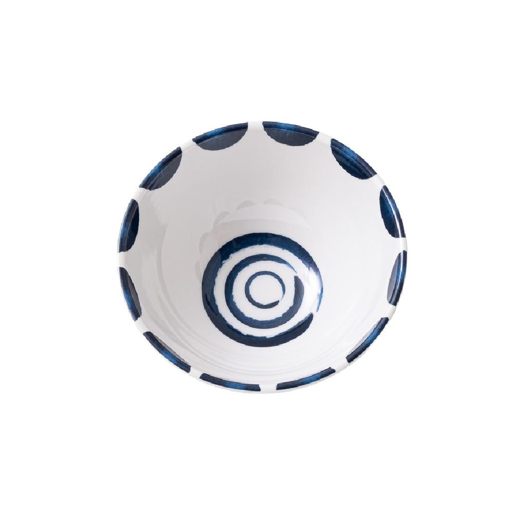 White ceramic bowl with blue spiral design on a white background