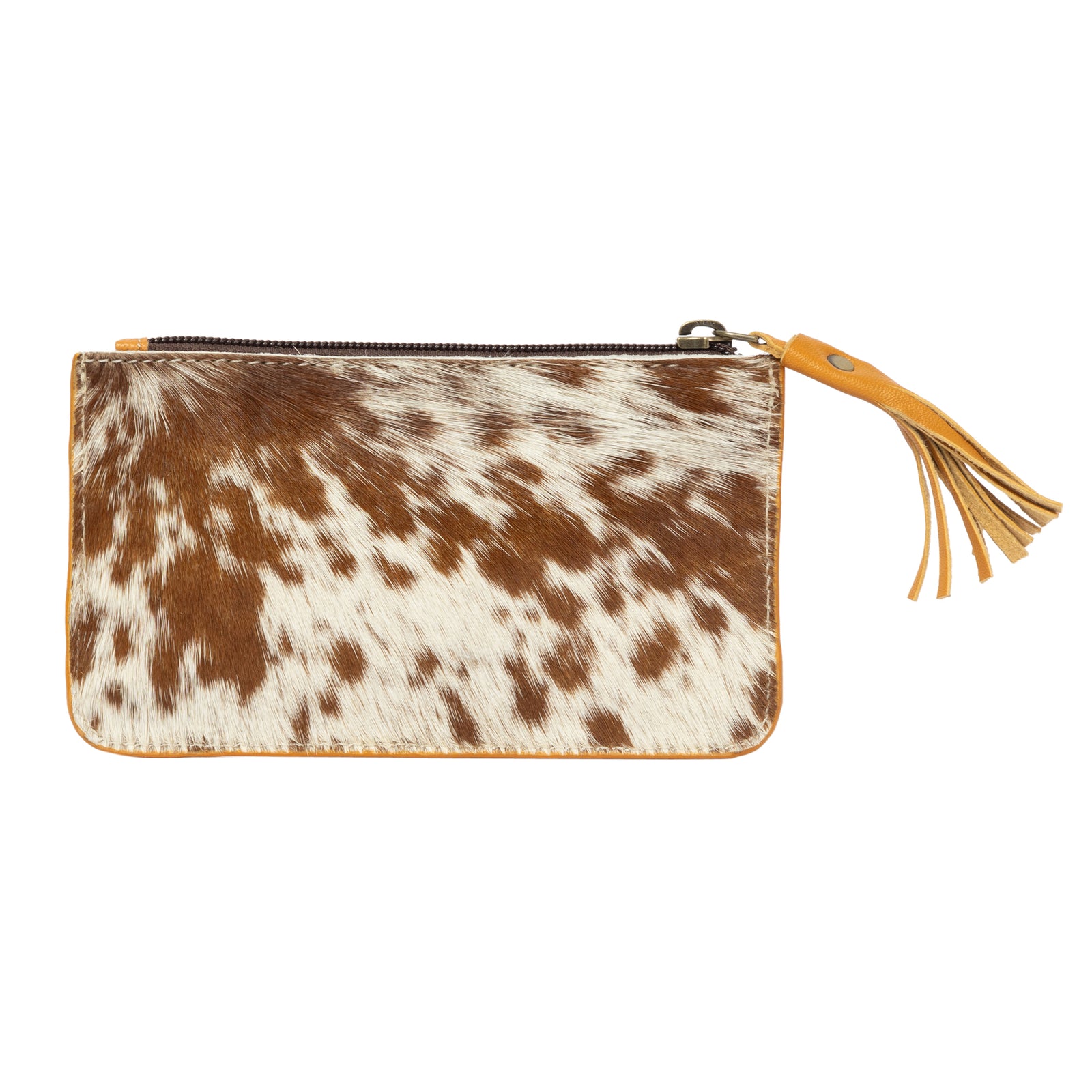 Cow print pouch with a yellow strap and tassel on a white background