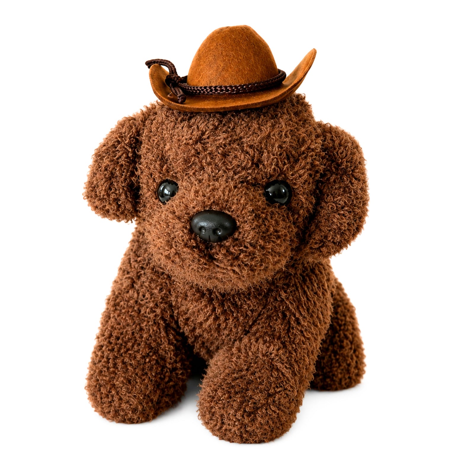 A brown plush puppy toy wearing a small felt cowboy hat, photographed against a clean white background.