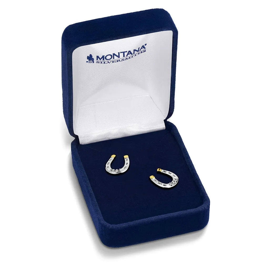 Horseshoe-shaped earrings in a Montana Silversmiths box on a white background