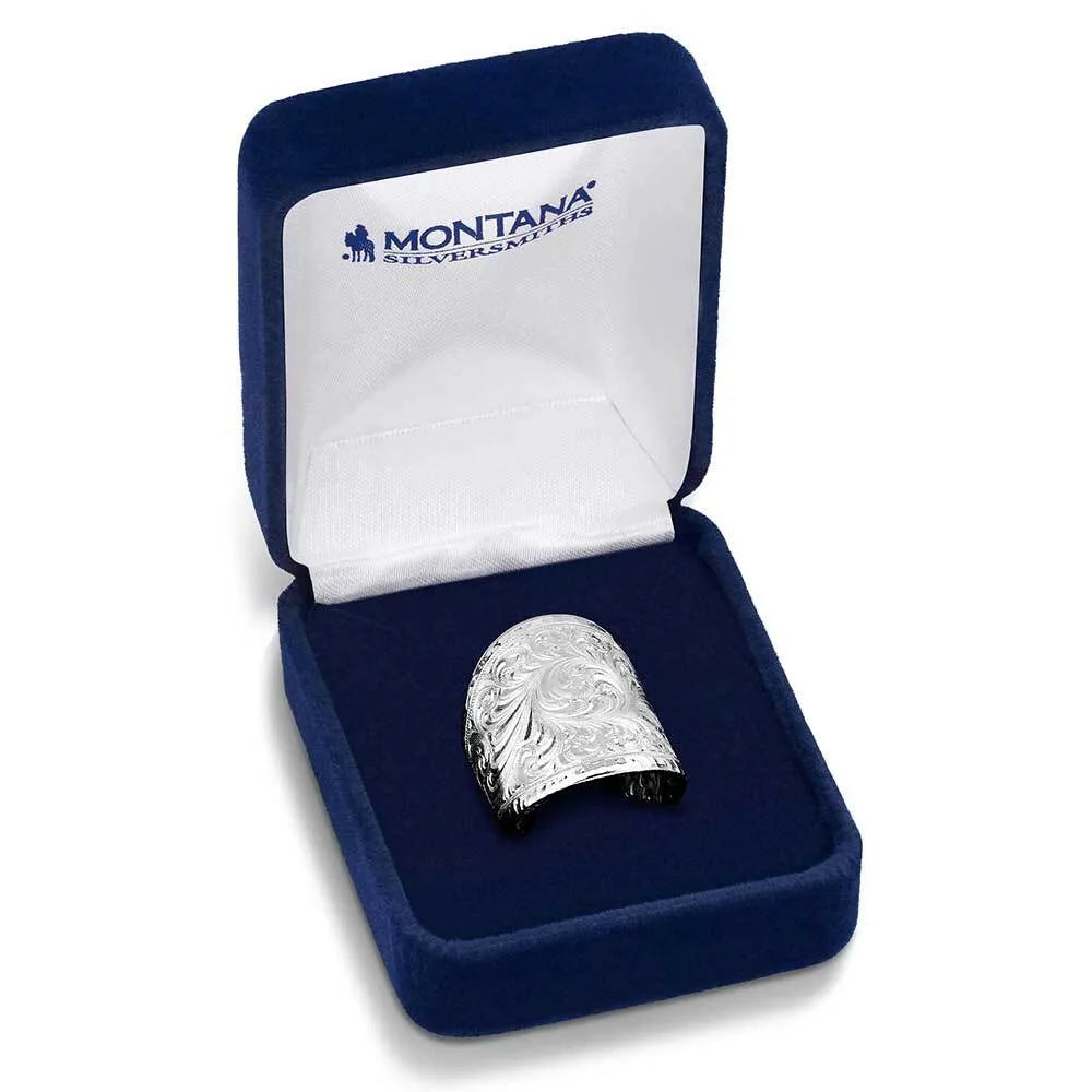 Montana Silversmith Out West Ring. Silver ring in a blue Montana Silversmiths box on a white background