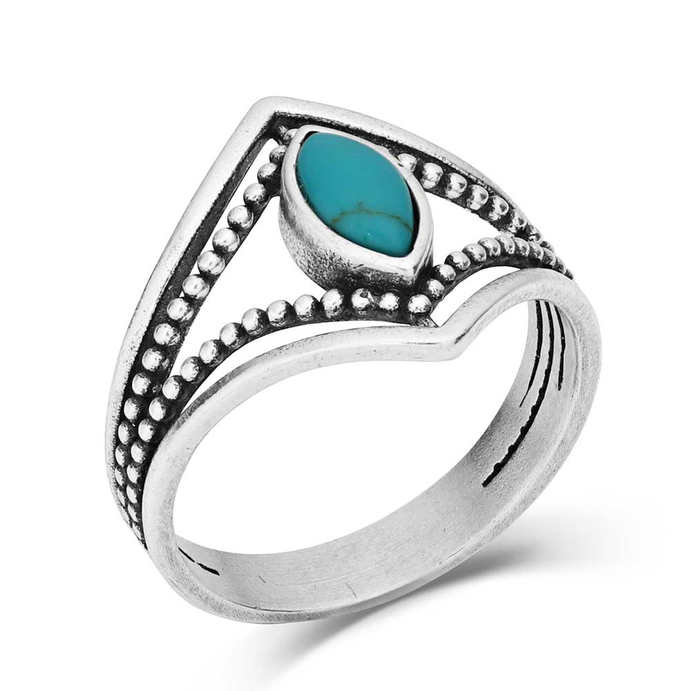 Montana Silversmiths Turquoise Mirage Ring. A silver-colored metal ring with a central turquoise stone, featuring a twisted rope design on the band.