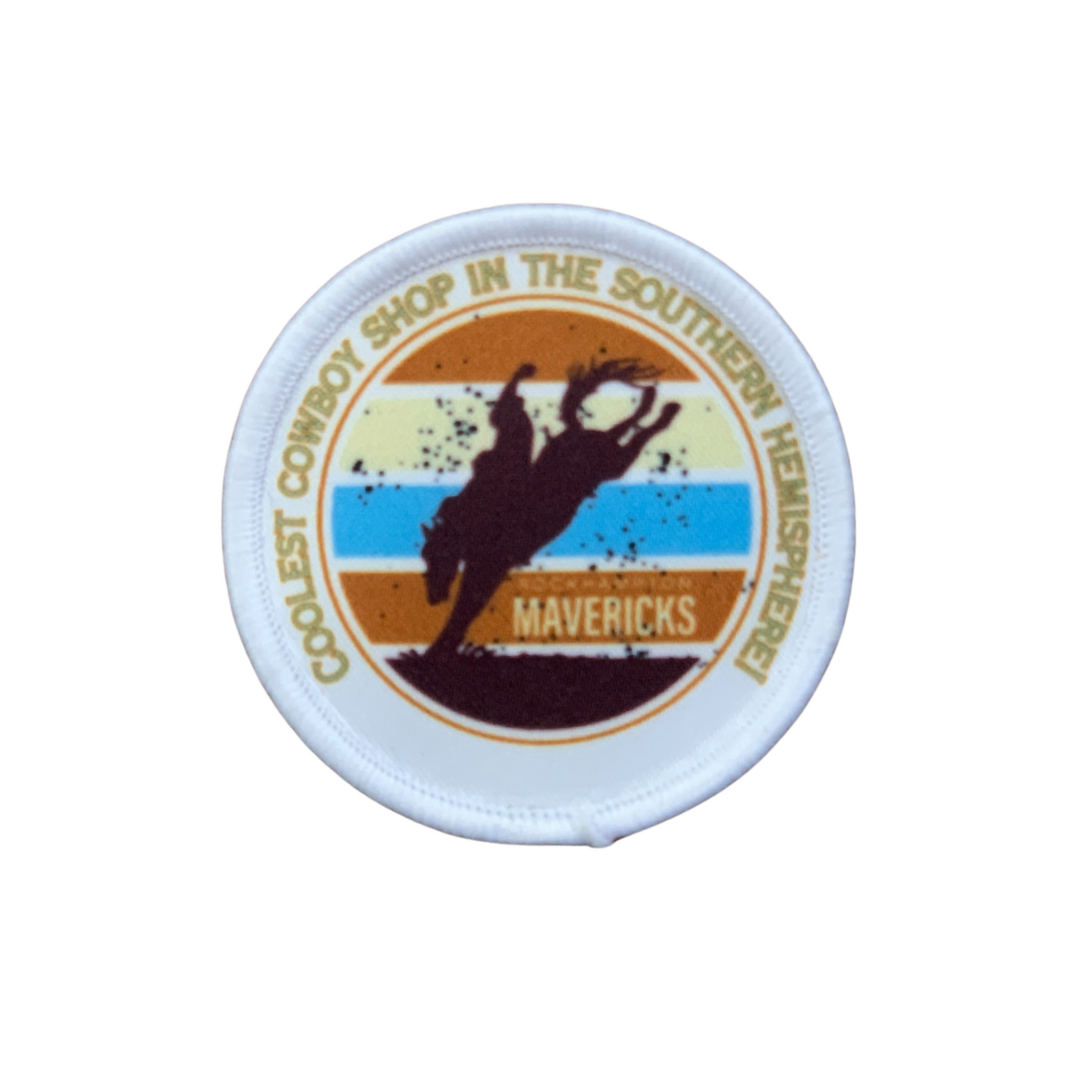 Rocky Mavericks Cowboy Hat Patch. Round patch with cowboy graphic and text on a white background