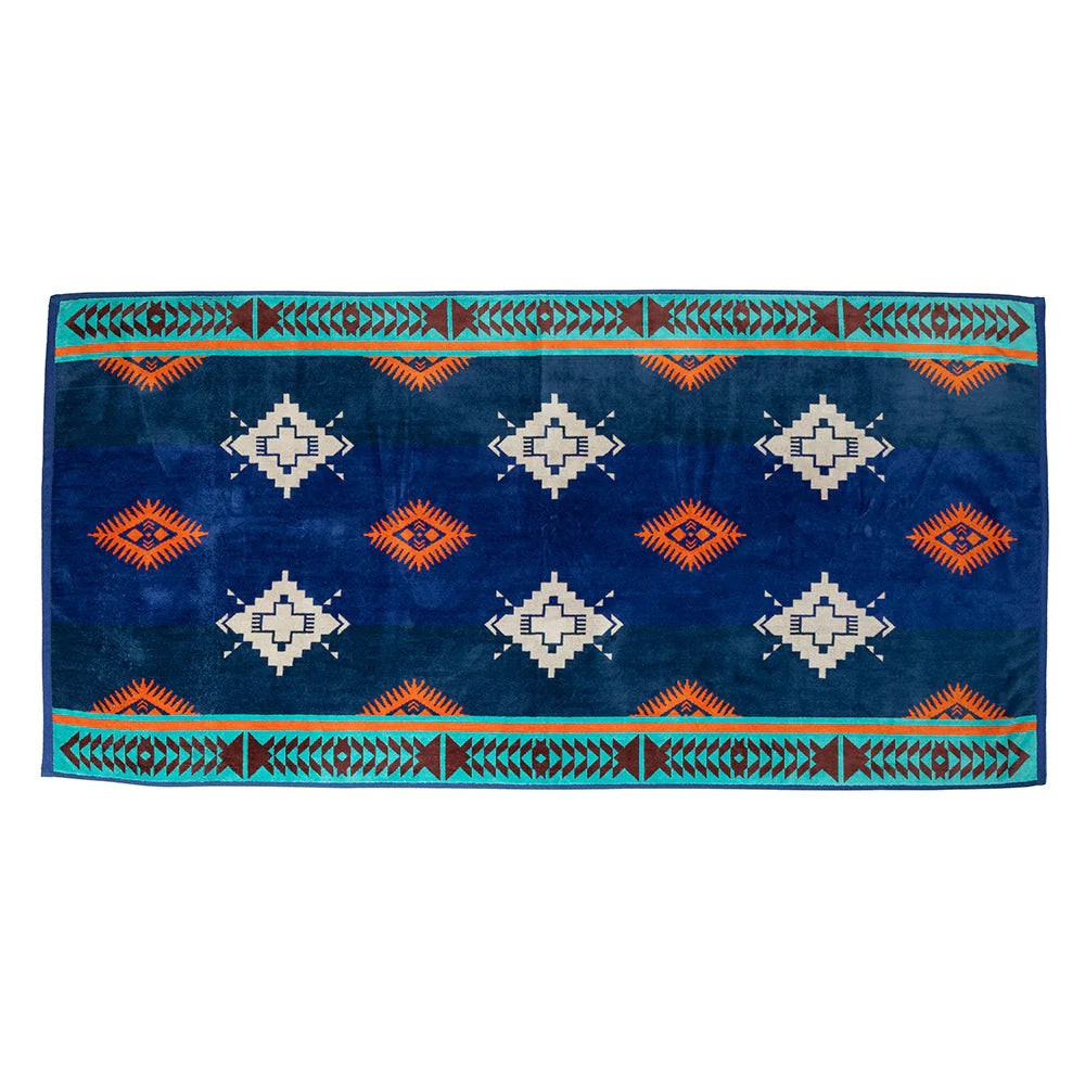 Tribal Rain Towel Set. A set of folded towels in blue, orange, turquoise, and brown with a geometric tribal pattern, stacked on top of each other.