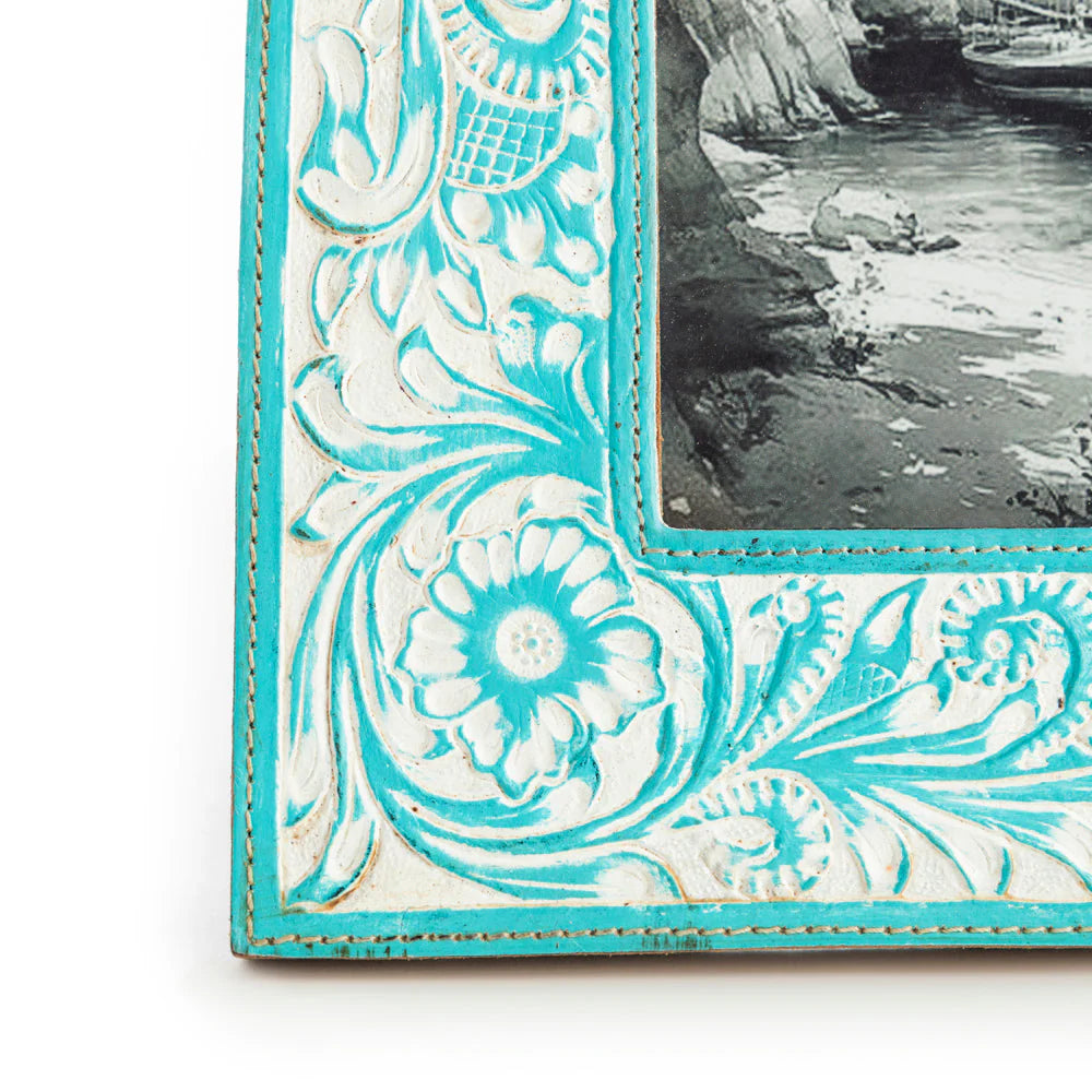 Prairie Breeze Picture Frame. A leather picture frame with turquoise embossing featuring floral and scroll designs.