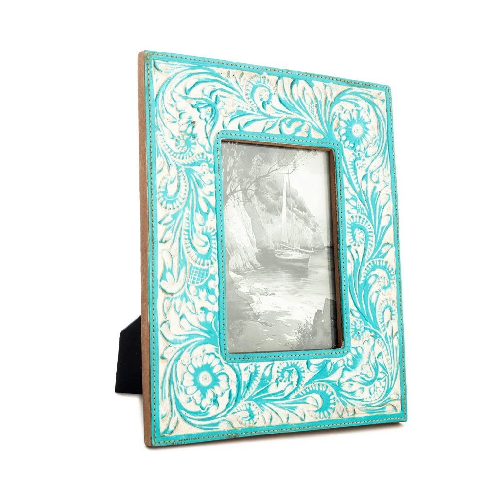 Prairie Breeze Picture Frame. A leather picture frame with turquoise embossing featuring floral and scroll designs.