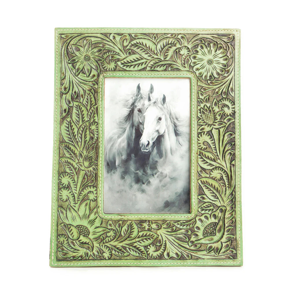 Meadows Green Bloom Photo Frame. A green leather photo frame with embossed floral and leaf patterns, containing a photo of a white horse.