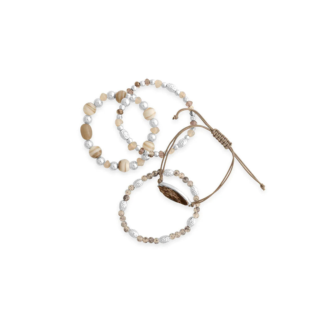 Set of beaded bracelets on a white background