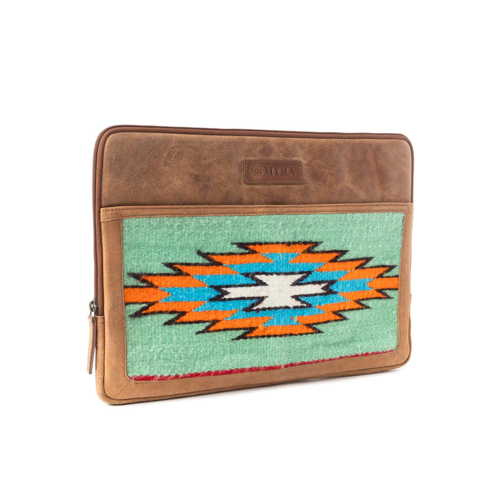 Minerva Prairie Laptop Case. A laptop case with a geometric pattern in turquoise, burgundy, and gold, framed by brown leather.