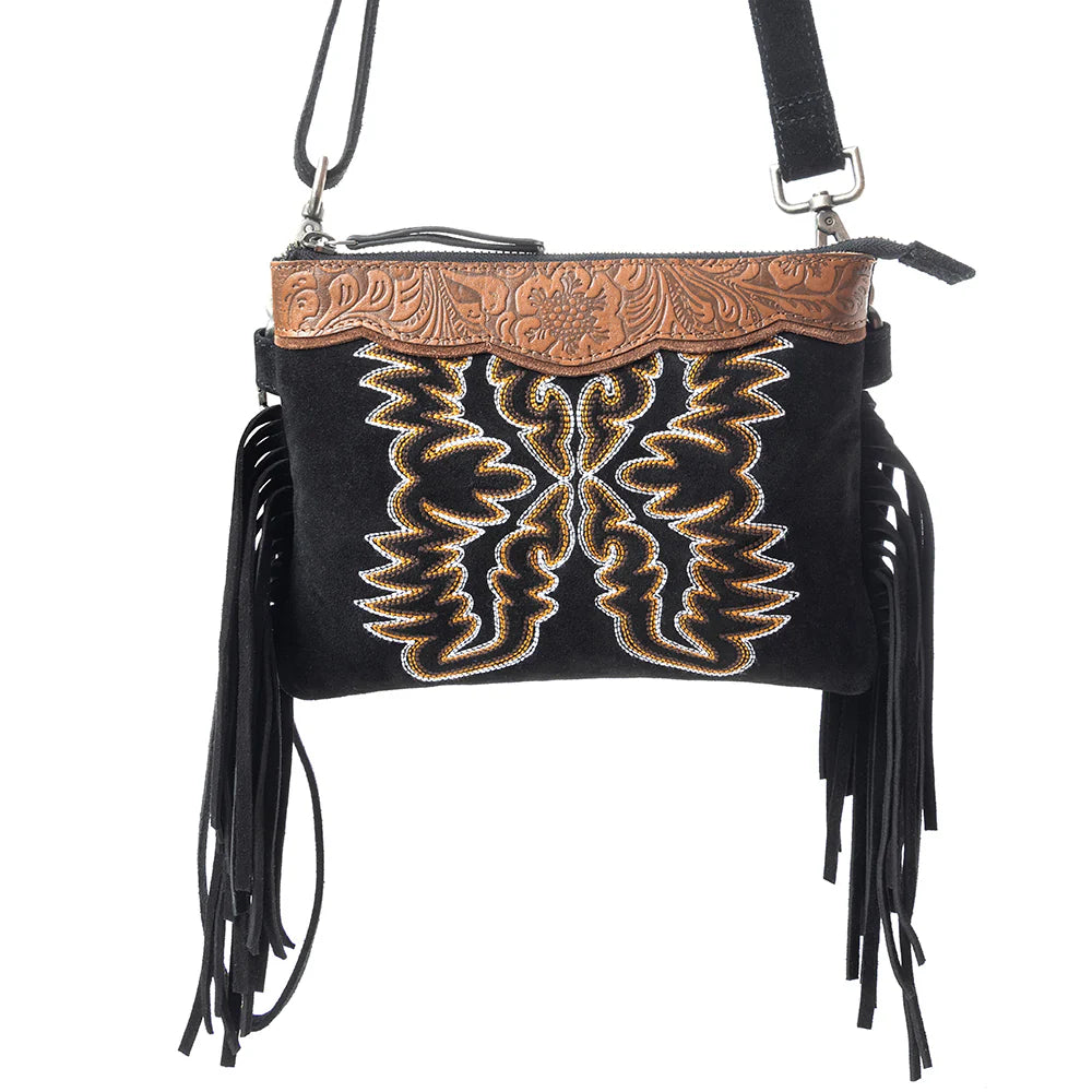 Desert Wing Crossbody Bag In Black. Black handbag with gold embroidery and black fringes on a white background.