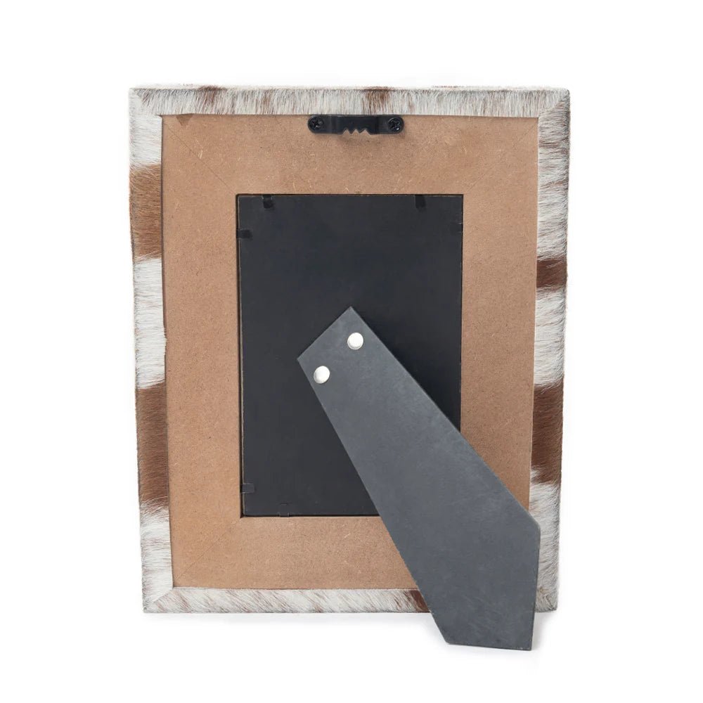 Tumbleweed Trail Photo Frame. Decorative photo frame with brown and white cowhide design.