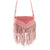 Wild West Fringe Leather Crossbody Bag in Pink. Pink fringed handbag with a white background