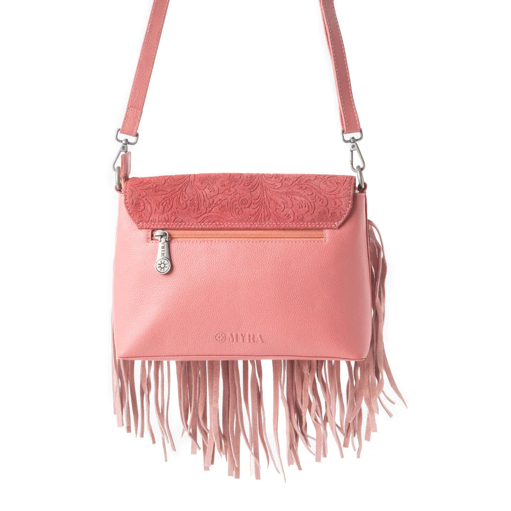 Wild West Fringe Leather Crossbody Bag in Pink. Pink crossbody bag with fringe details on a white background