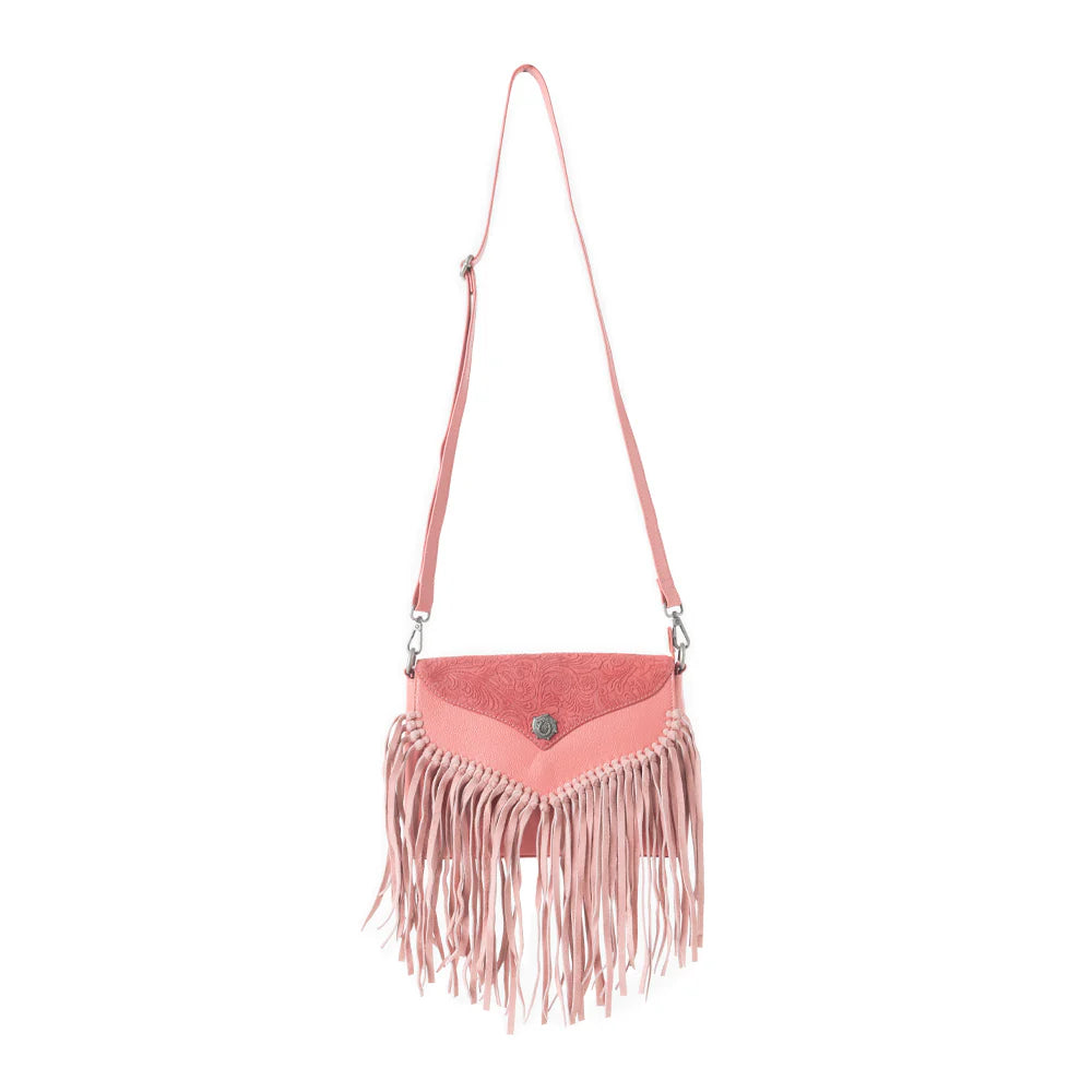 Wild West Fringe Leather Crossbody Bag in Pink. Pink suede handbag with fringe on a white background
